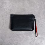 CHRISTIAN LOUBOUTRIN BLACK TAS